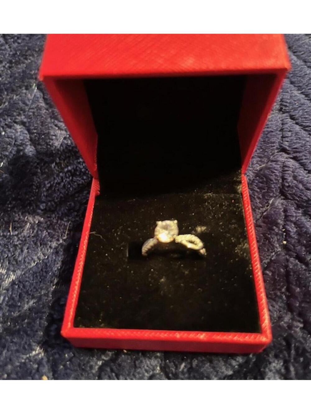 Elegant Silver-Tone Engagement Ring with Clear Stone